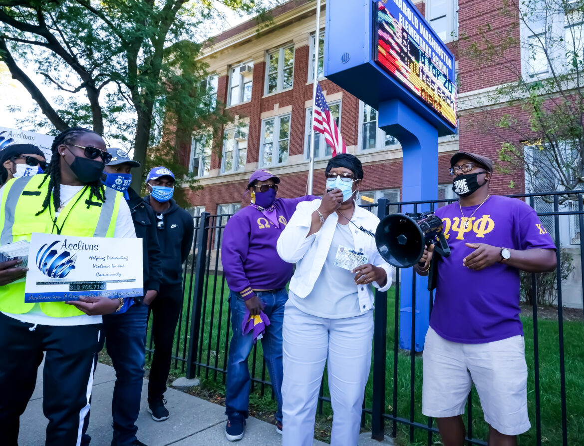 CARLOS TUCKER WITH ALDERMAN MICHELLE HARRIS